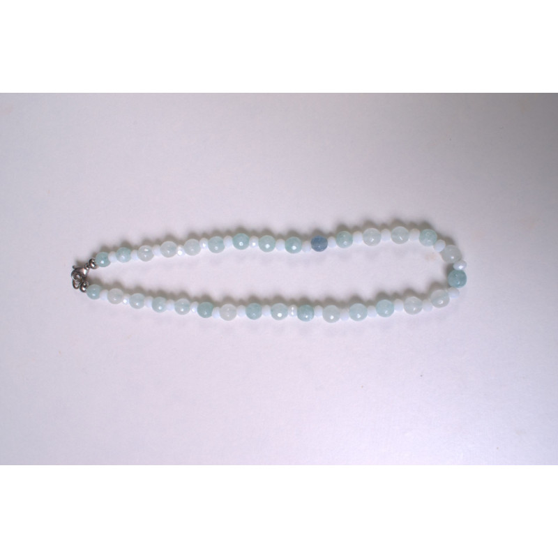 Stone necklace with light blue crystal