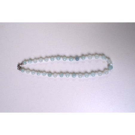 Stone necklace with light blue crystal